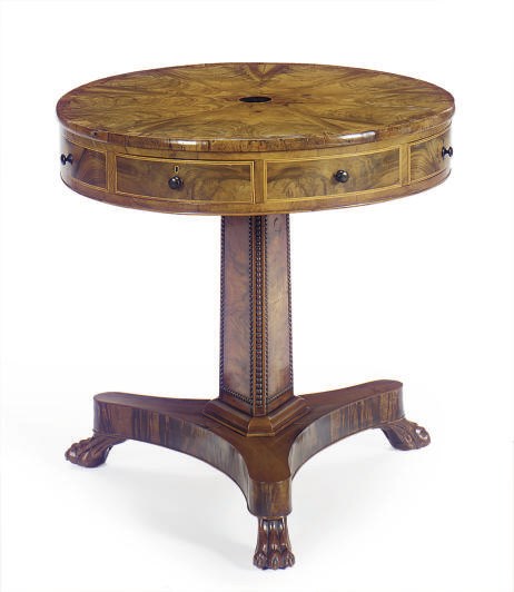 A NORTH EUROPEAN WALNUT AND YEWOOD DRUM TABLE,