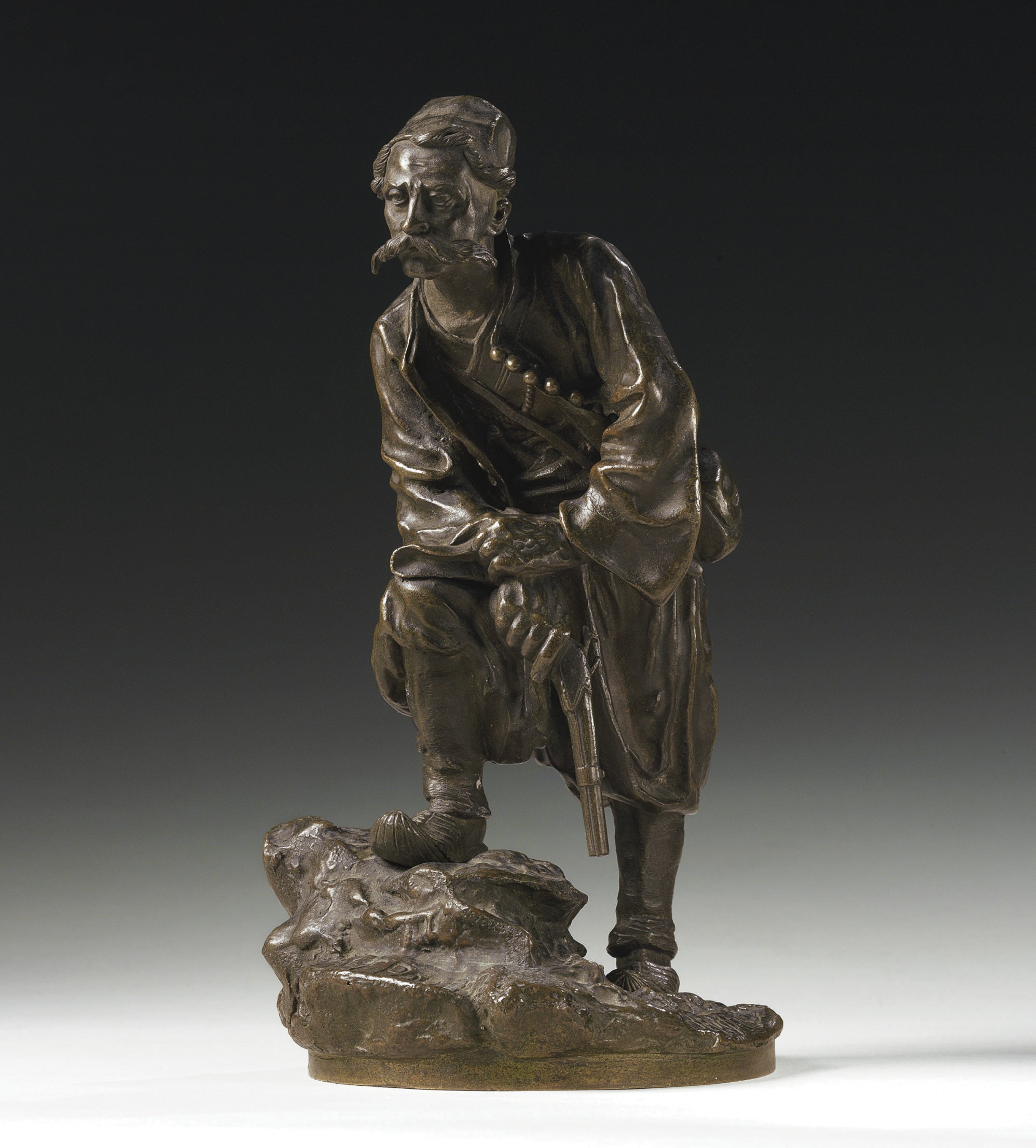 A bronze figure of a Montenegrin