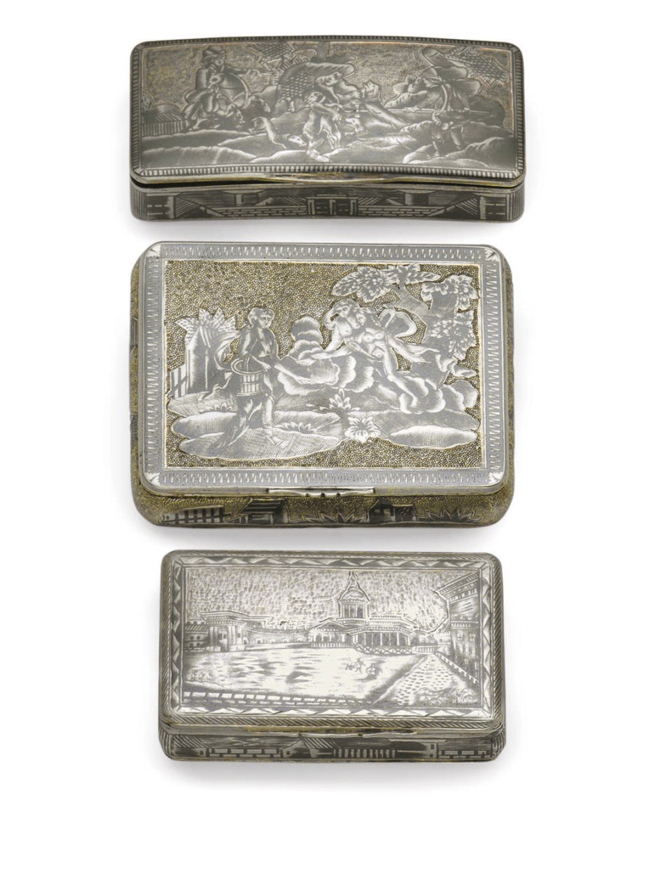 Two silver-gilt and niello snuffboxes and a cigarette case