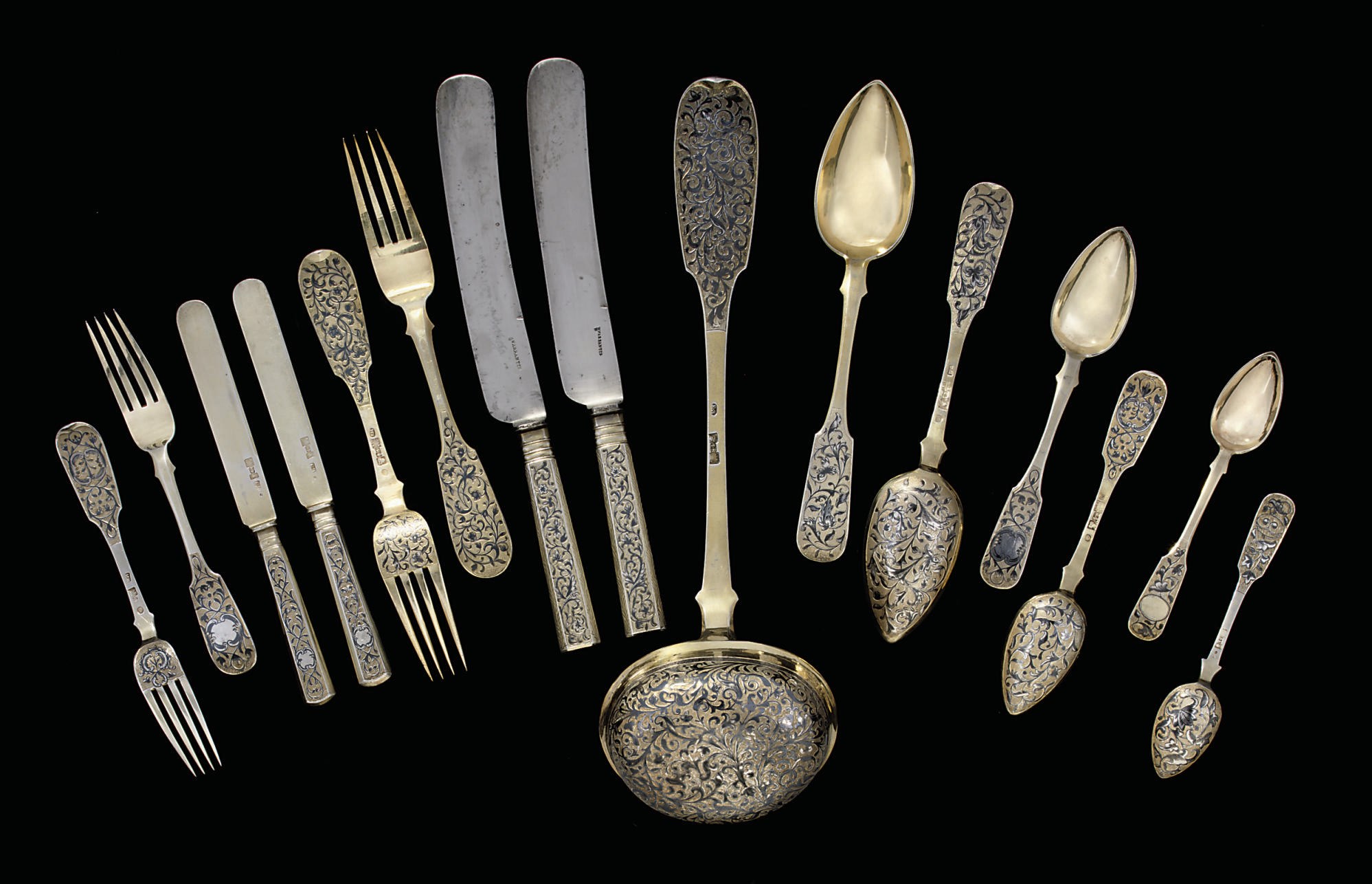 A composite silver-gilt and niello table-service