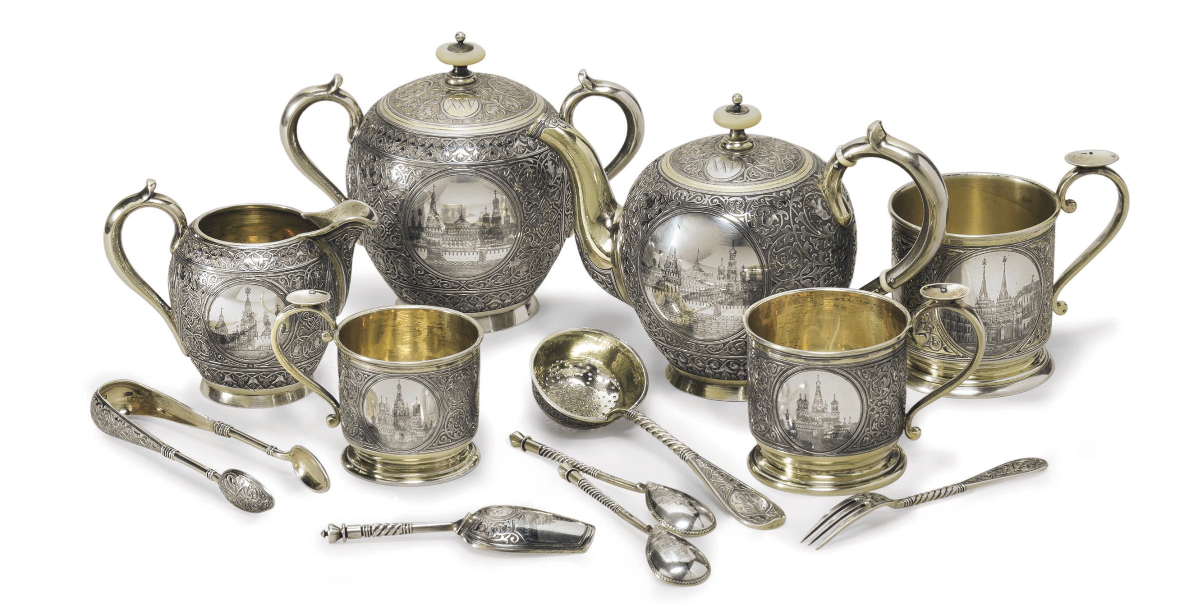 A parcel-gilt and niello part tea service