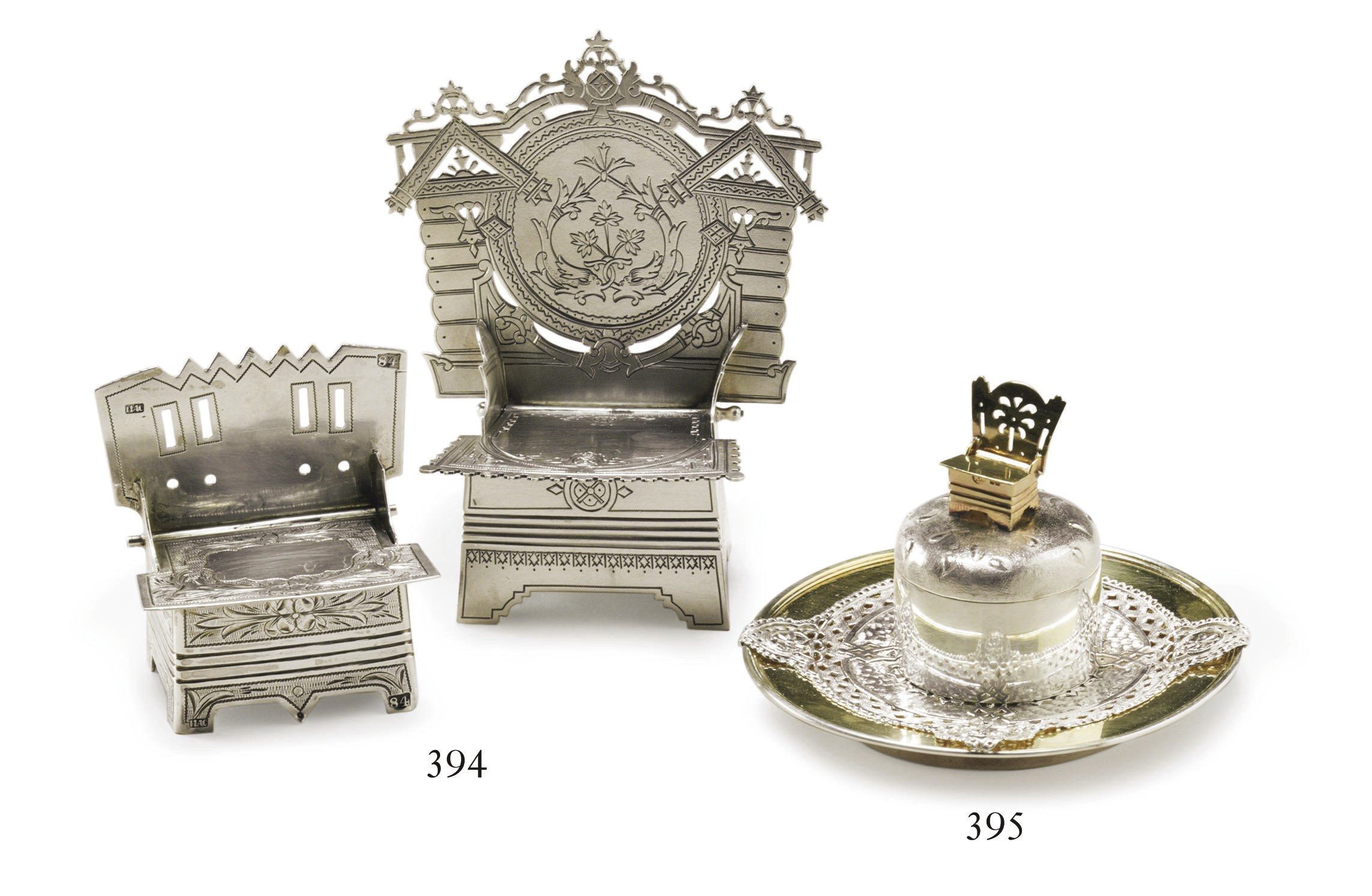 Two silver salt thrones