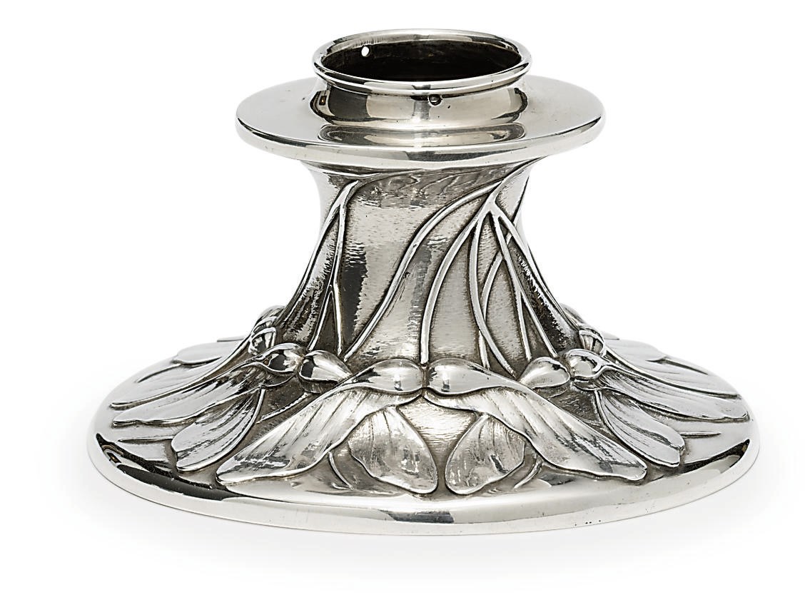 A silver candle holder