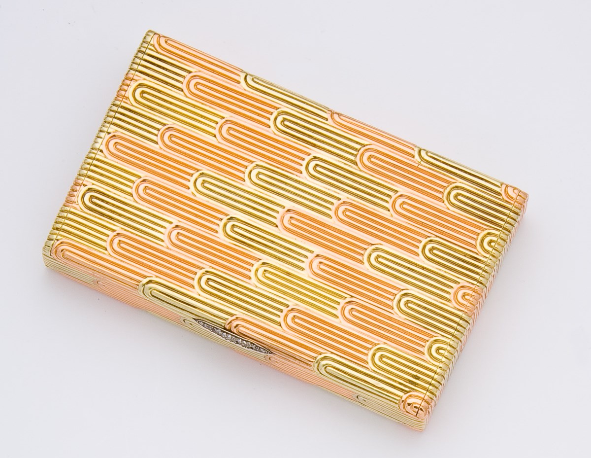 A jewelled two-colour gold cigarette-case