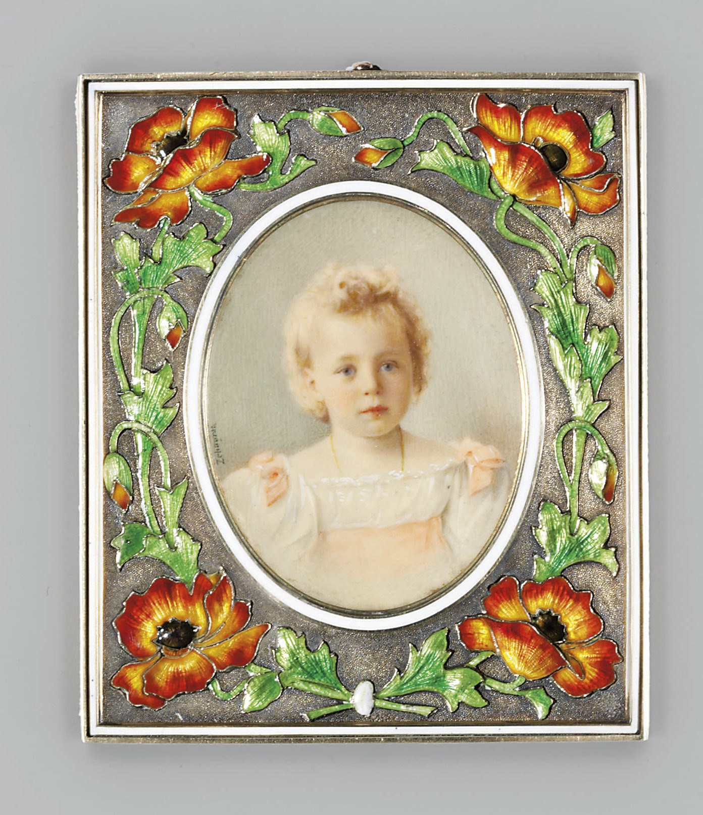 A silver gilt and guilloché enamel miniature frame