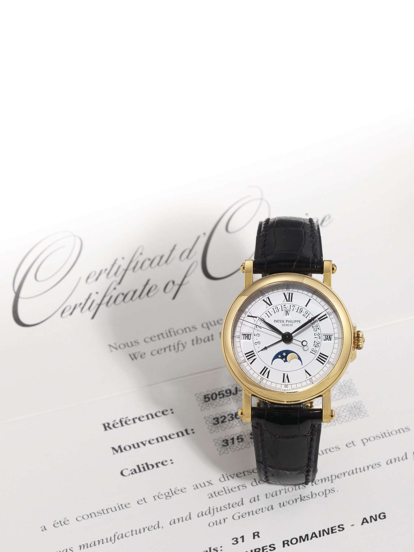 PATEK PHILIPPE, OFFICER REF. 5059J

18K GOLD SELF-WINDING PERPETUAL CALENDAR WRISTWATCH WITH SWEEP SECONDS, MOON-PHASE AND RETROGRADE DATE DISPLAY