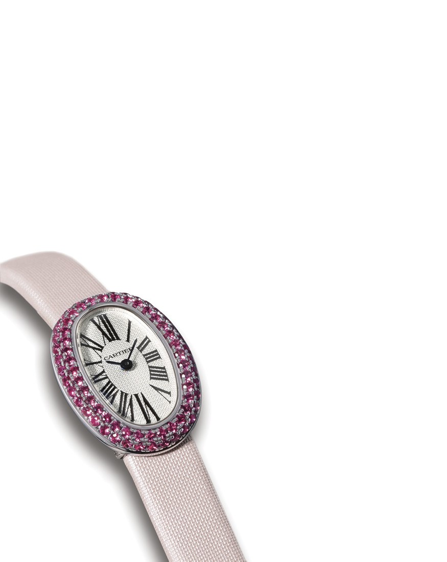CARTIER, MINI "BAIGNOIRE"

LADY'S 18K WHITE GOLD AND PINK SAPPHIRE-SET OVAL WRISTWATCH