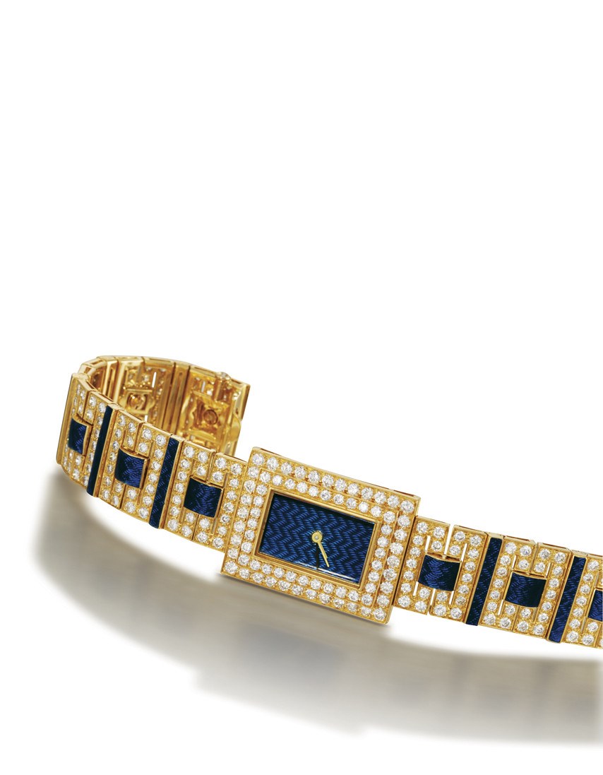M. GÉRARD

18K GOLD, ENAMEL AND DIAMOND-SET BRACELET WATCH WITH ENAMEL DIAL