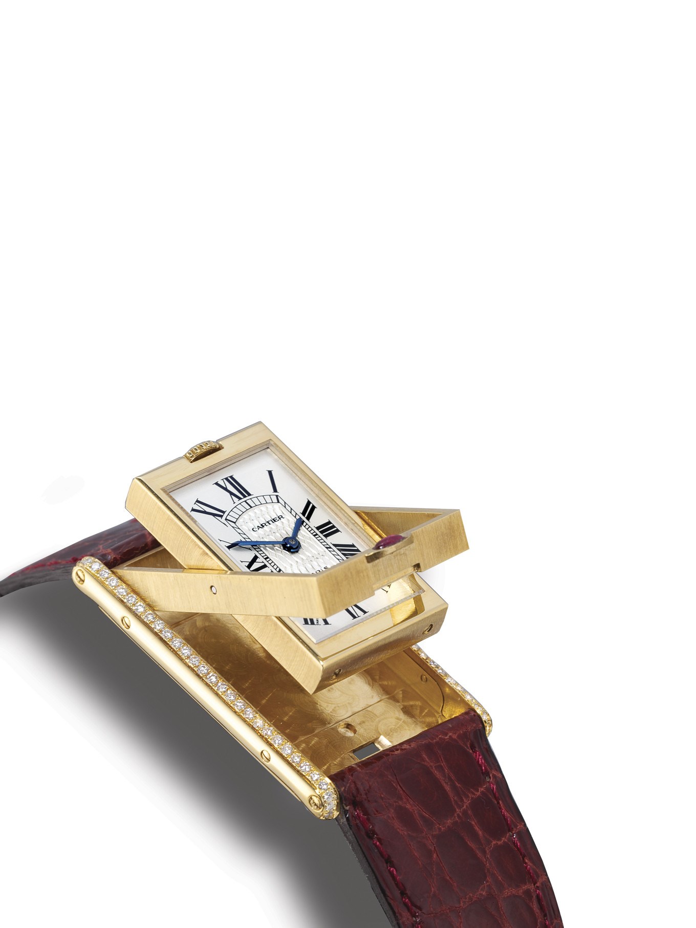 CARTIER, COLLECTIONS PRIVÉES DE CARTIER - "TANK BASCULANTE"

FINE AND RARE, LIMITED EDITION LADY'S 18K GOLD AND DIAMOND-SET MANUAL-WINDING RECTANGULAR WRISTWATCH