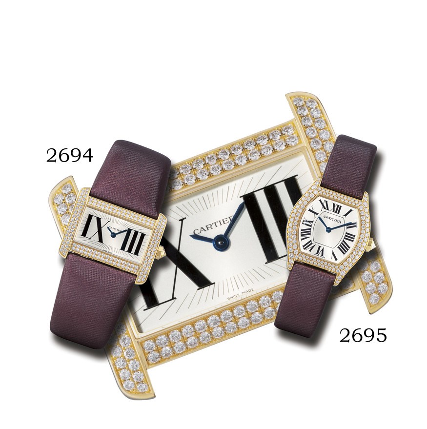 CARTIER, SMALL "TORTUE"

LADY'S 18K GOLD AND DIAMOND-SET MANUAL-WINDING TONNEAU-SHAPED WRISTWATCH