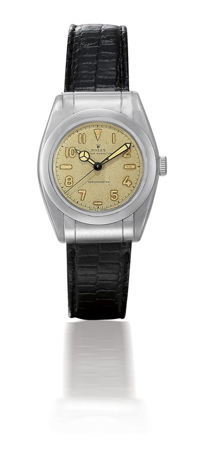 ROLEX, "OYSTER PERPETUAL CHRONOMETER" BUBBLE BACK REF. 3599

STAINLESS STEEL SELF-WINDING TONNEAU-SHAPED WRISTWATCH WITH SWEEP SECONDS AND HOODED LUGS