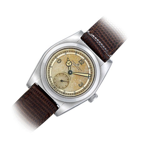 ROLEX, "OYSTER PERPETUAL" BUBBLE BACK REF. 2940

STAINLESS STEEL SELF-WINDING WRISTWATCH WITH SMALL SECONDS
