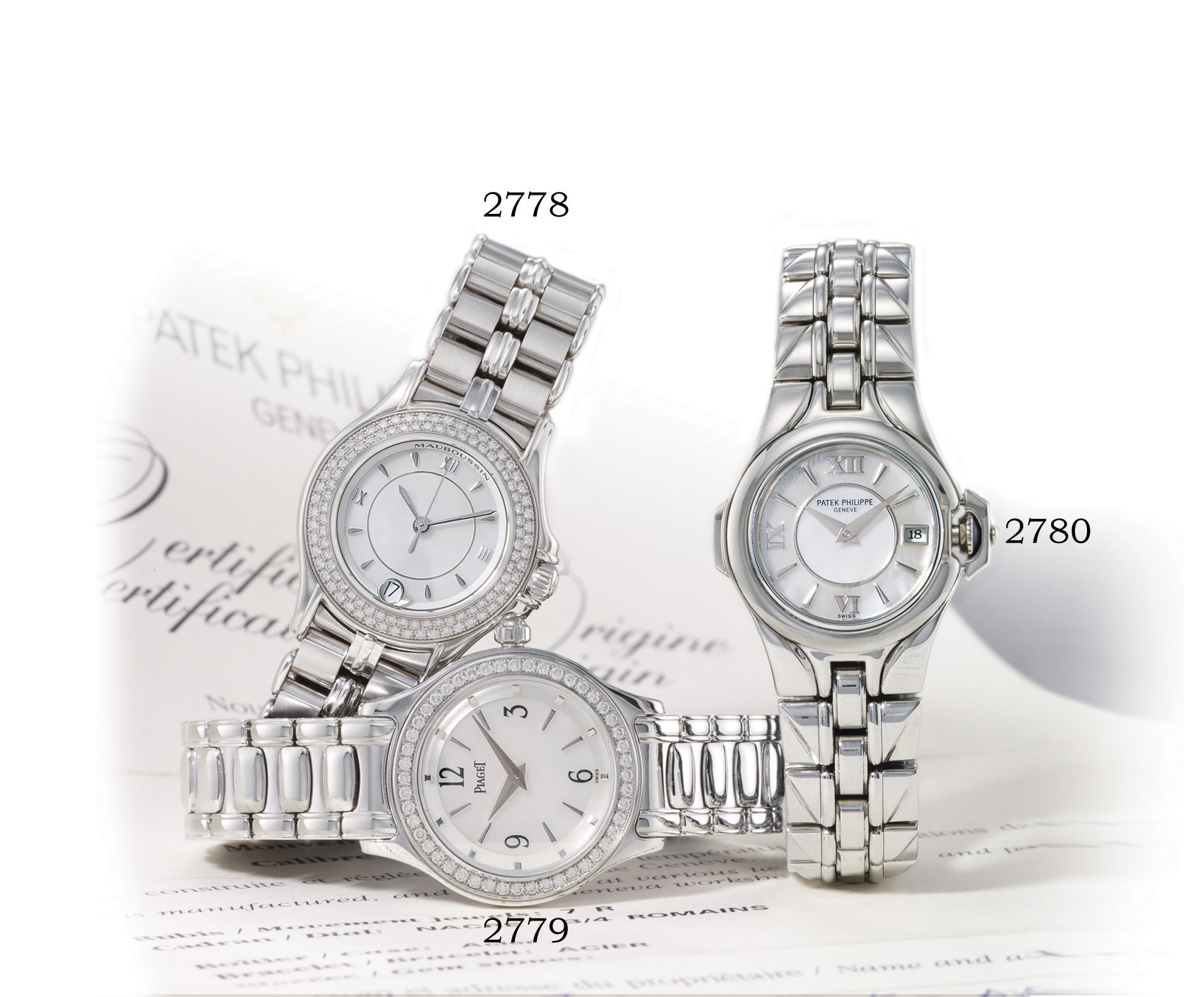 MAUBOUSSIN

LADY'S 18K WHITE GOLD AND DIAMOND-SET BRACELET WATCH WITH DATE DISPLAY AND MOTHER-OF-PEARL DIAL