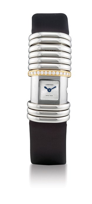 CARTIER, "DÉCLARATION"

LADY'S TITANIUM, STAINLESS STEEL, 18K PINK GOLD AND DIAMOND-SET RECTANGULAR WRISTWATCH WITH CONCEALED DIAL