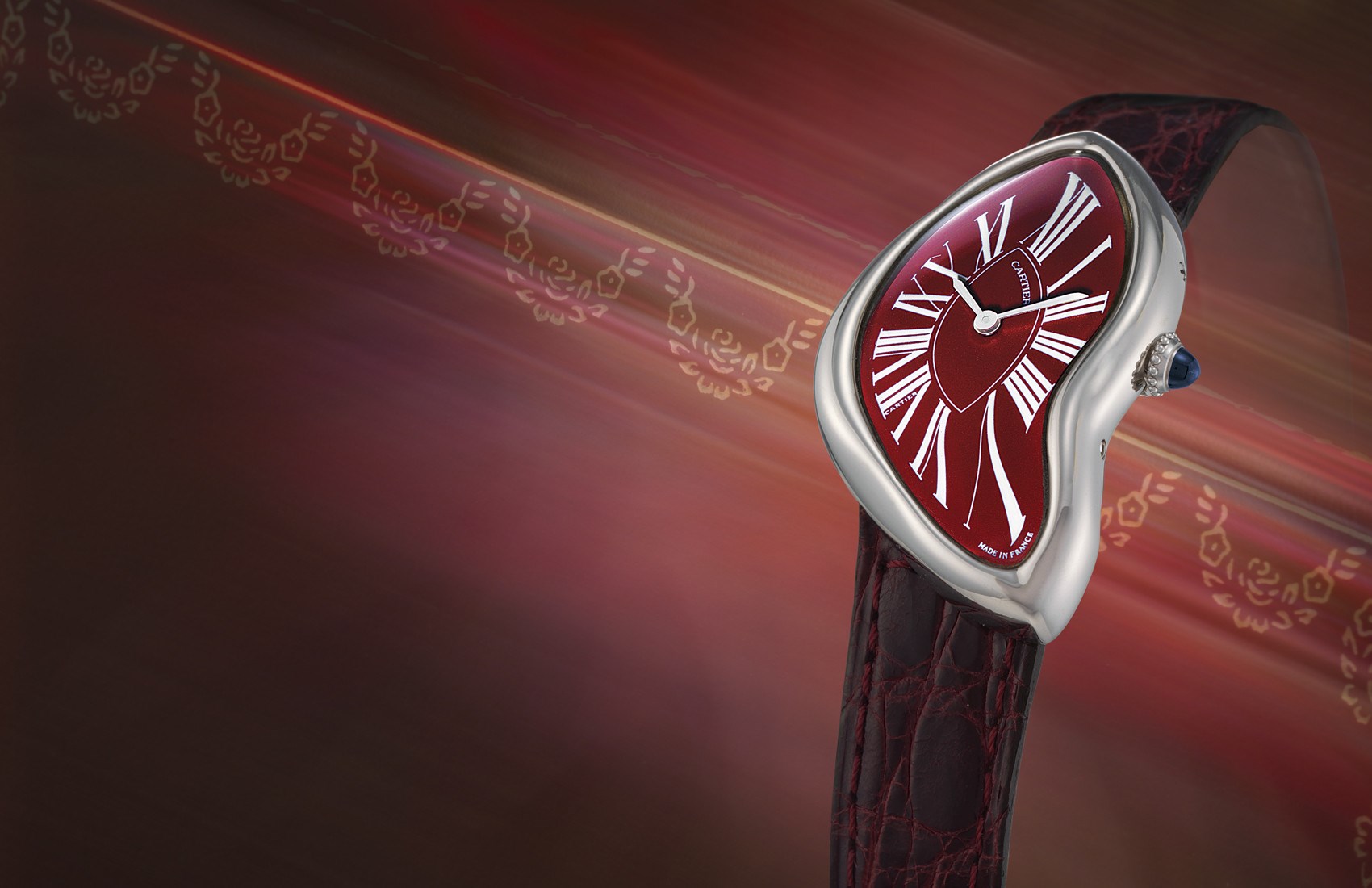 CARTIER, "CRASH"

ATTRACTIVE AND HIGHLY UNUSUAL, LADY'S 950 PLATINUM MANUAL-WINDING ASYMMETRIC WRISTWATCH WITH A UNIQUE CUSTOM-MADE DIAL