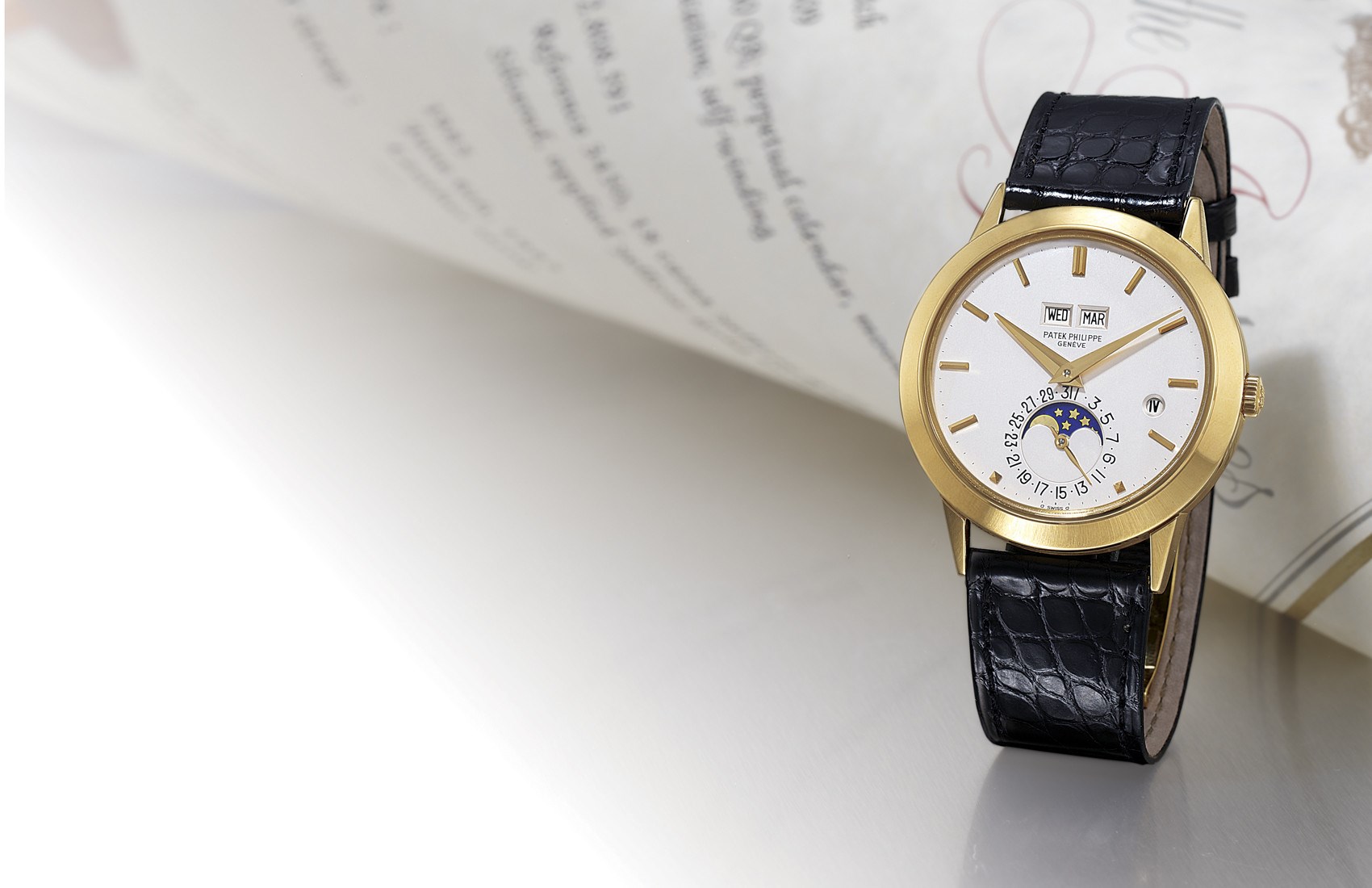PATEK PHILIPPE, REF. 3450 3RD SERIES

VERY FINE AND RARE, 18K GOLD SELF-WINDING PERPETUAL CALENDAR WRISTWATCH WITH MOON-PHASE DISPLAY