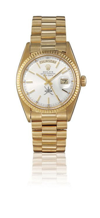 ROLEX, "DAY-DATE" REF. 1803

18K GOLD SELF-WINDING BRACELET WATCH WITH SWEEP SECONDS, DAY AND DATE DISPLAY