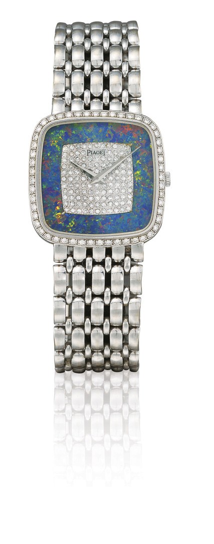 PIAGET

18K WHITE GOLD AND DIAMOND-SET MANUAL-WINDING SQUARED BRACELET WATCH WITH OPAL DIAL
