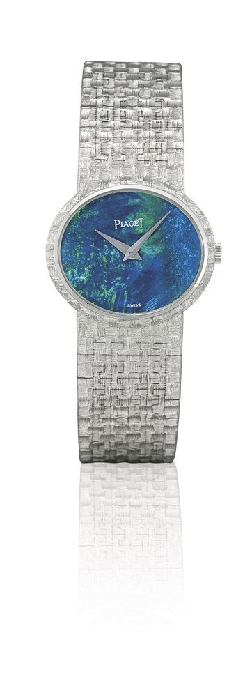 PIAGET

LADY'S 18K WHITE GOLD MANUAL-WINDING OVAL-SHAPED BRACELET WATCH WITH OPAL DIAL