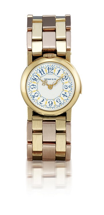 TIFFANY & CO., SMALL SIZE

18K GOLD KEYLESS LEVER MINUTE REPEATING PENDANT WATCH CONVERTED TO A BRACELET WATCH