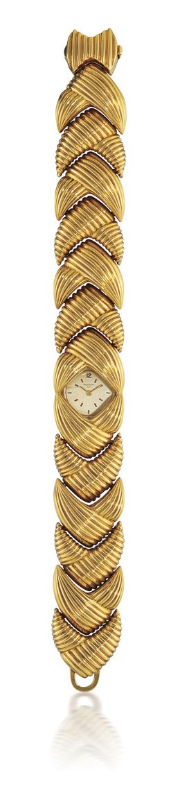 PATEK PHILIPPE, REF. 3104

LADY'S 18K GOLD MANUAL-WINDING BRACELET WATCH