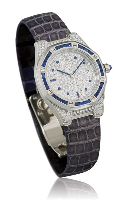 AUDEMARS PIGUET, "ROYAL OAK"

LADY'S 18K WHITE GOLD, DIAMOND AND SAPPHIRE-SET WRISTWATCH WITH DATE DISPLAY