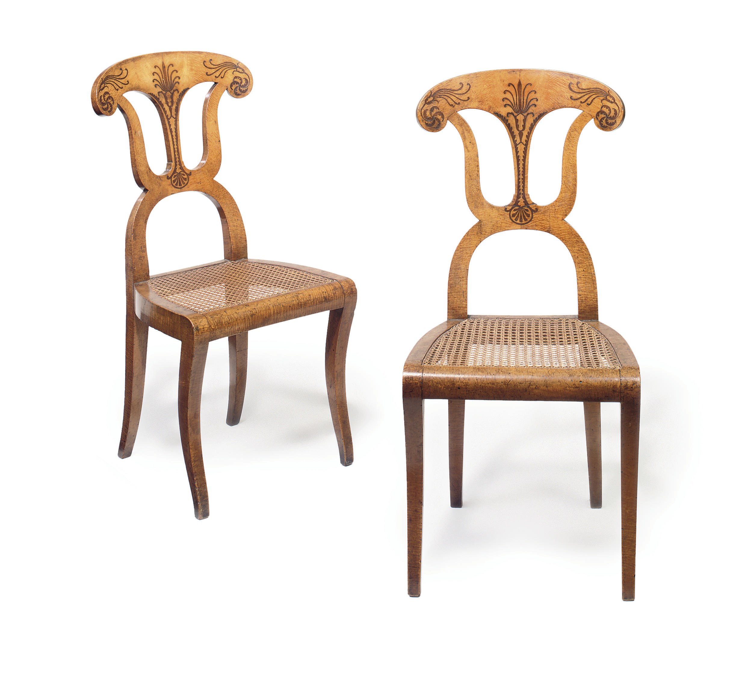 A PAIR OF BIEDERMEIER AMARANTH-INLAID AND KARELIAN BIRCH CHAIRS