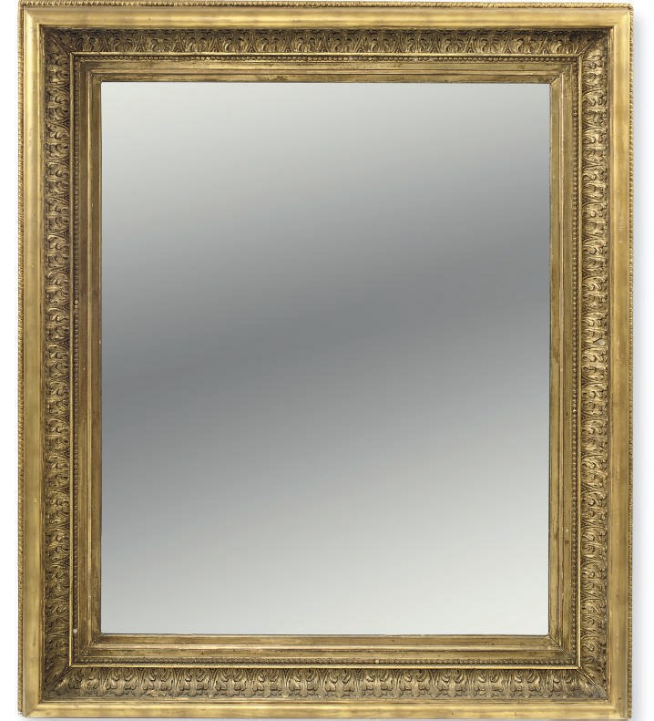 A GILTWOOD AND COMPOSITION PICTURE FRAME MIRROR