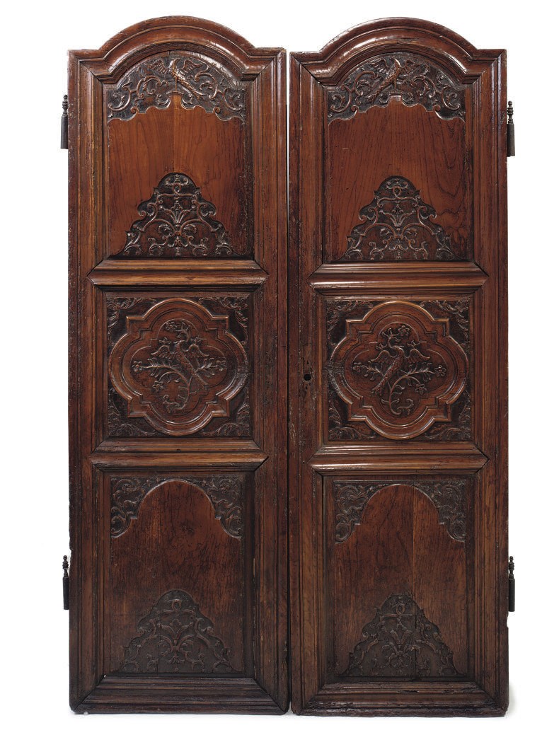 A PAIR OF LOUIS XV WALNUT ARMOIRE DOORS