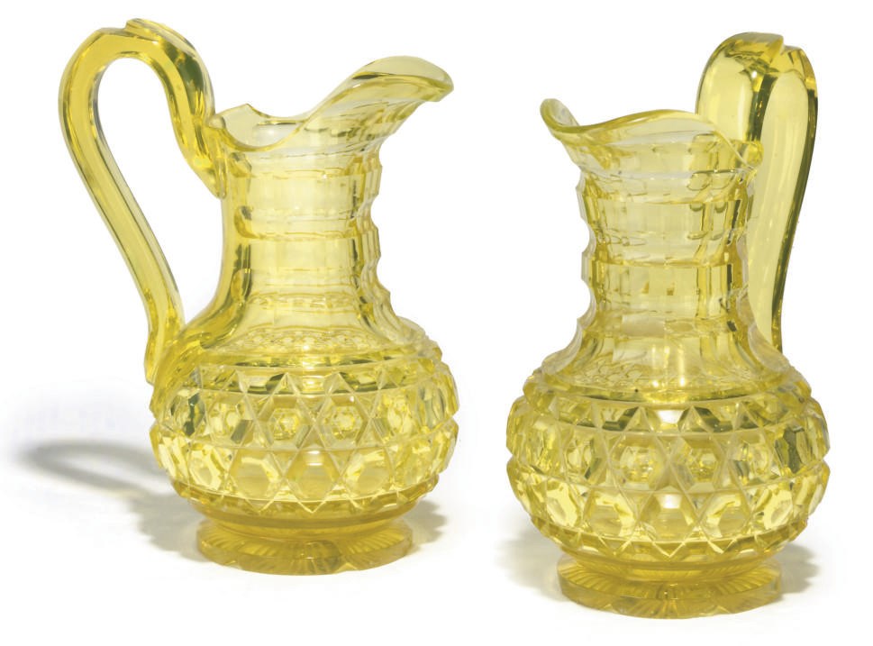 A PAIR OF BOHEMIAN 'ANNAGELB' CUT-GLASS JUGS