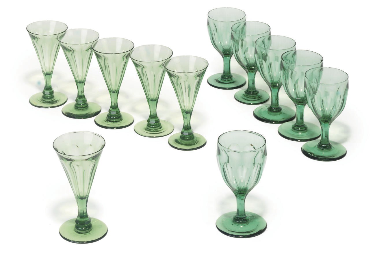 TWO SETS OF ENGLISH GREEN-TINTED WINE GLASSES