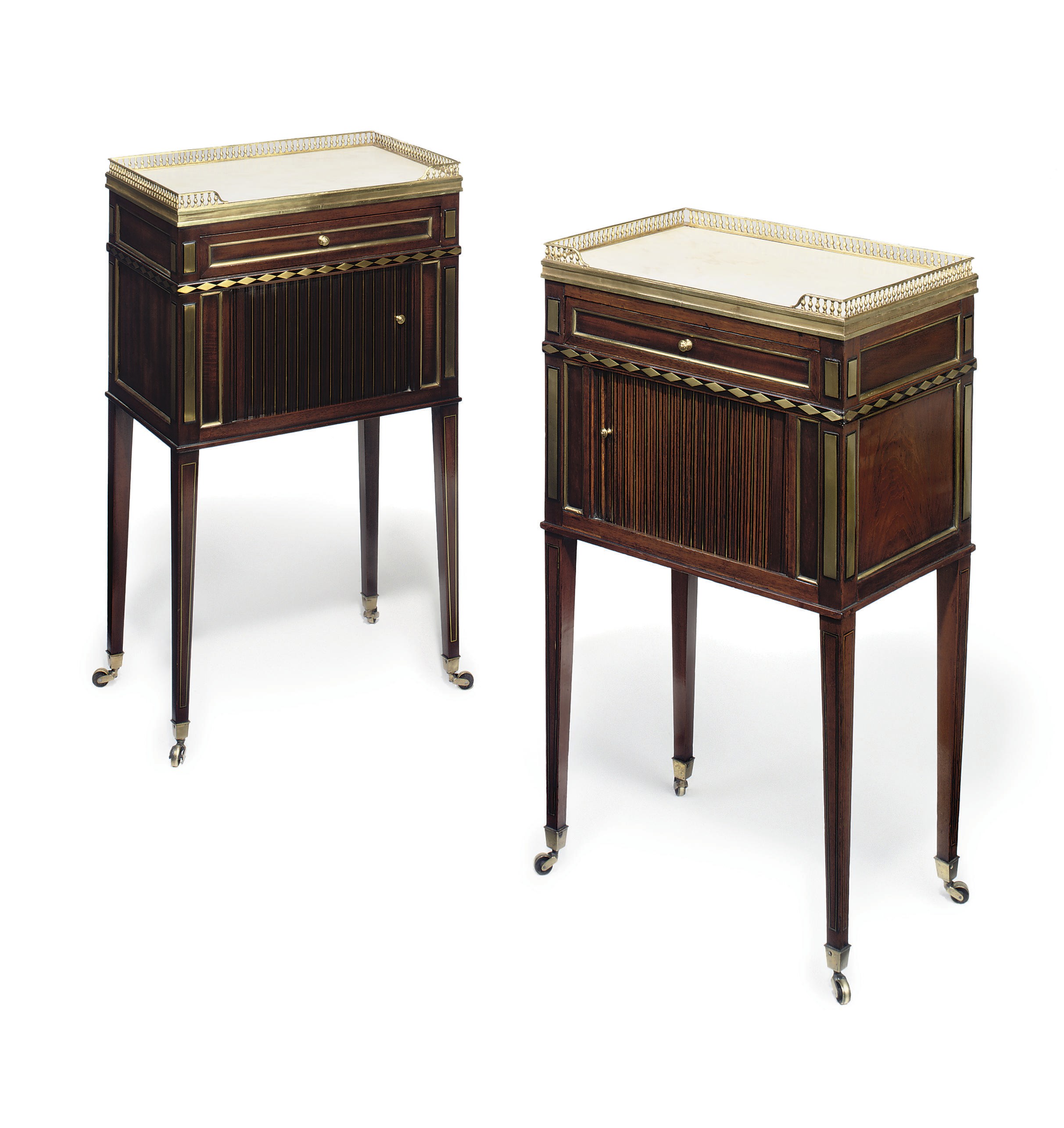 A PAIR OF RUSSIAN BRASS-MOUNTED EBONY AND MAHOGANY BEDSIDE CABINETS