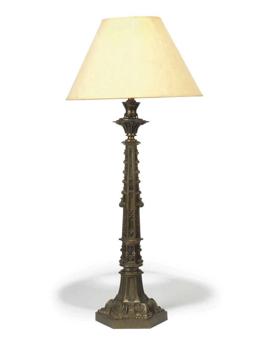 A WILLIAM IV GOTHIC BRASS LAMP BASE