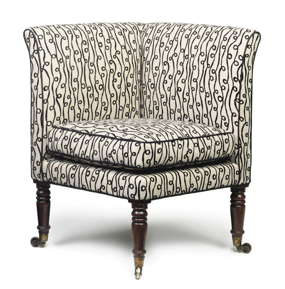 A LATE REGENCY GRAINED ROSEWOOD CORNER ARMCHAIR