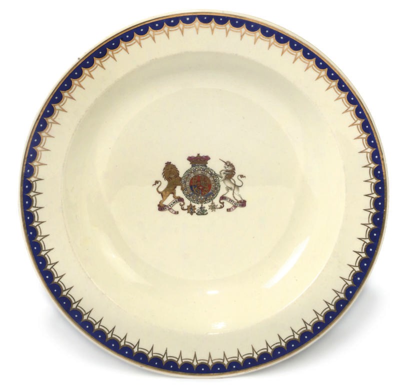 A WEDGWOOD CREAMWARE ARMORIAL SOUP PLATE
