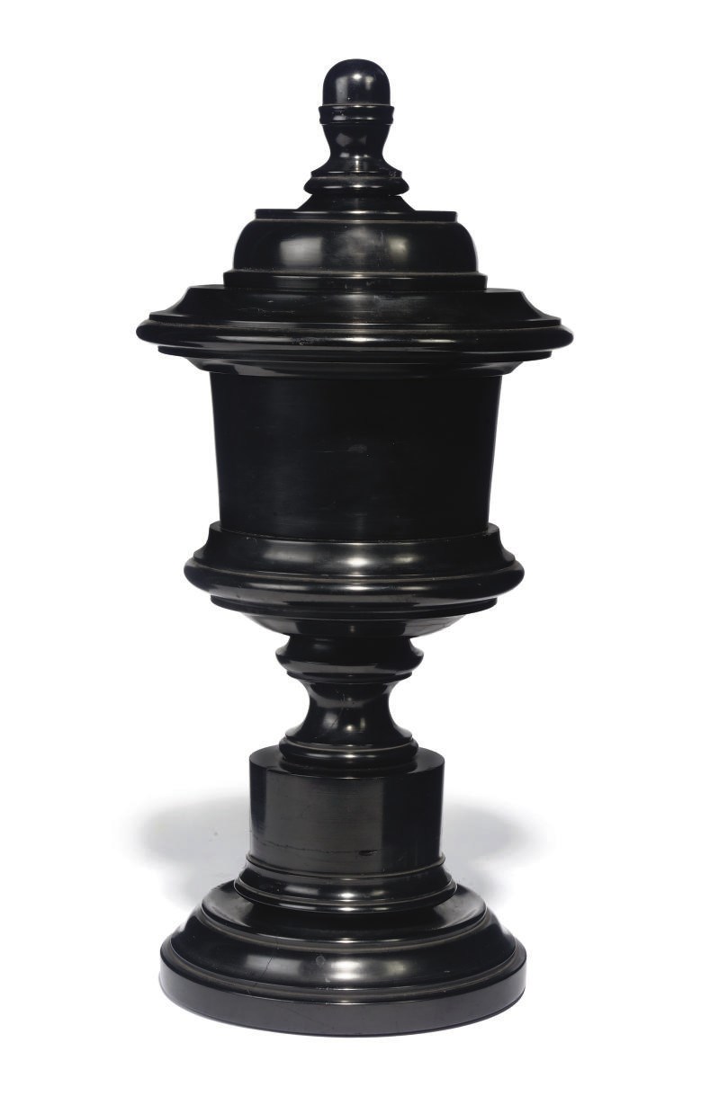 A SCOTTISH REGENCY CANNEL COAL URN AND COVER