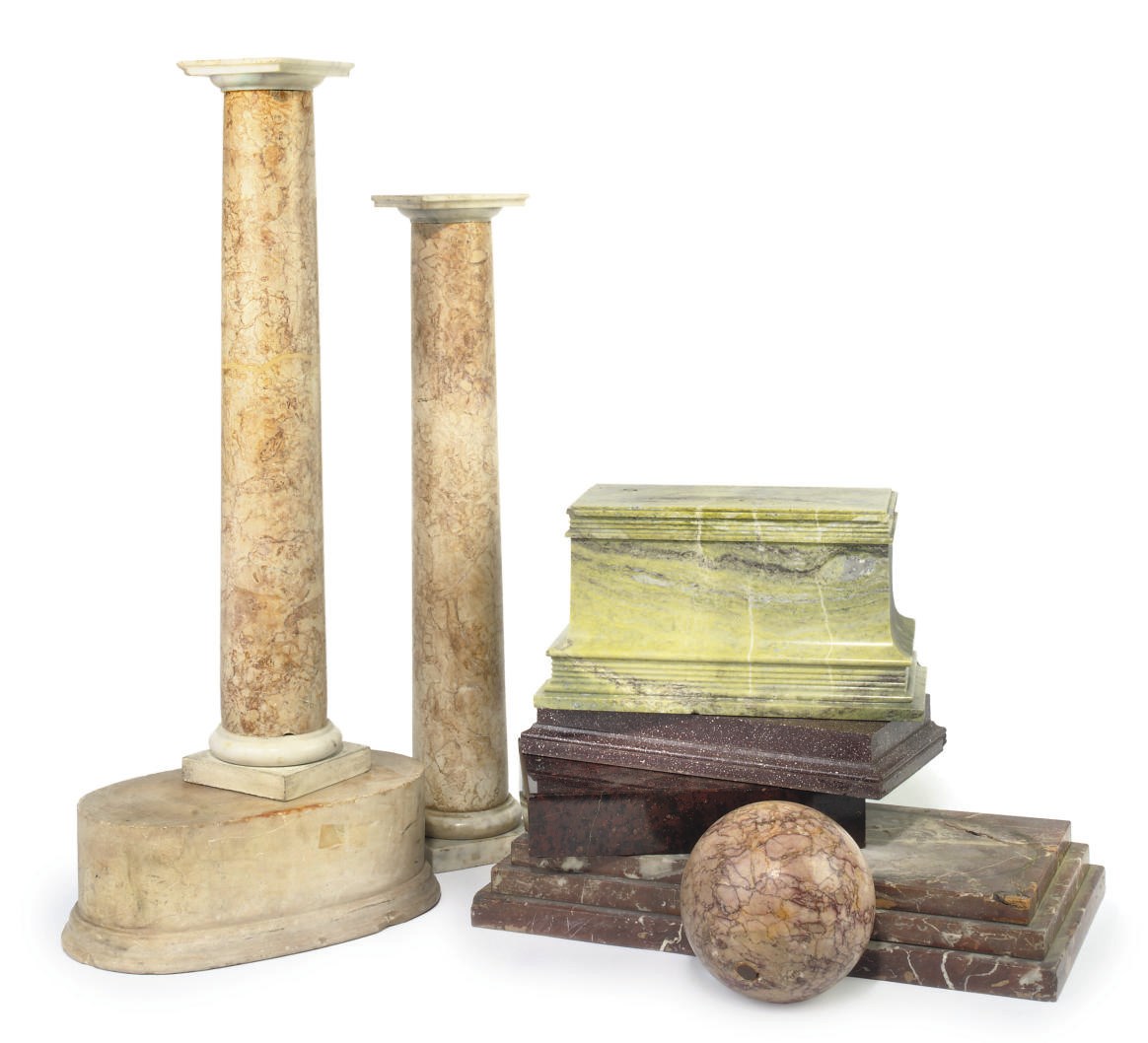 A PAIR OF VARIEGATED AND WHITE MARBLE COLUMNS