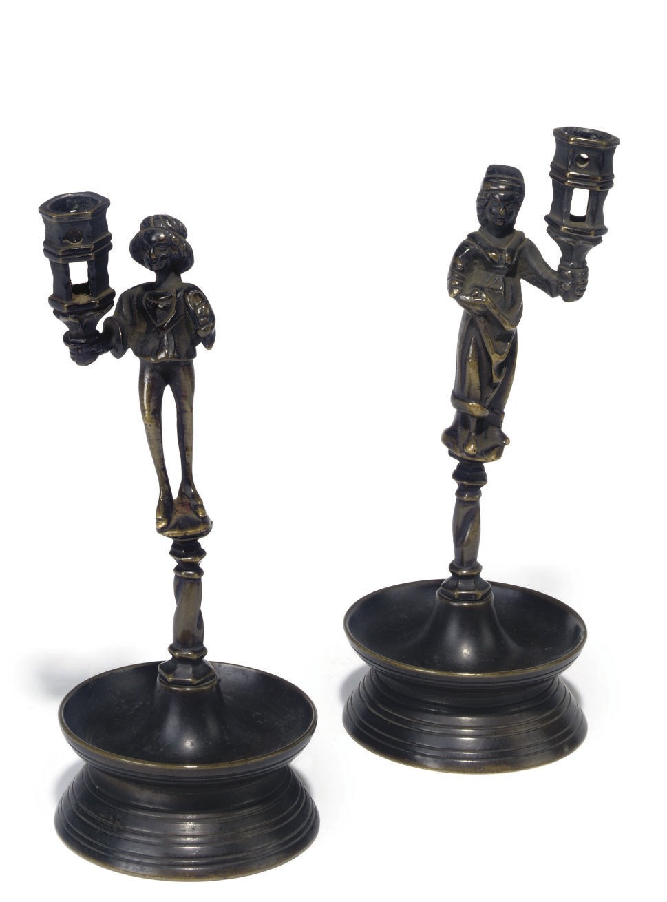 A PAIR OF BRASS FIGURAL CANDLESTICKS