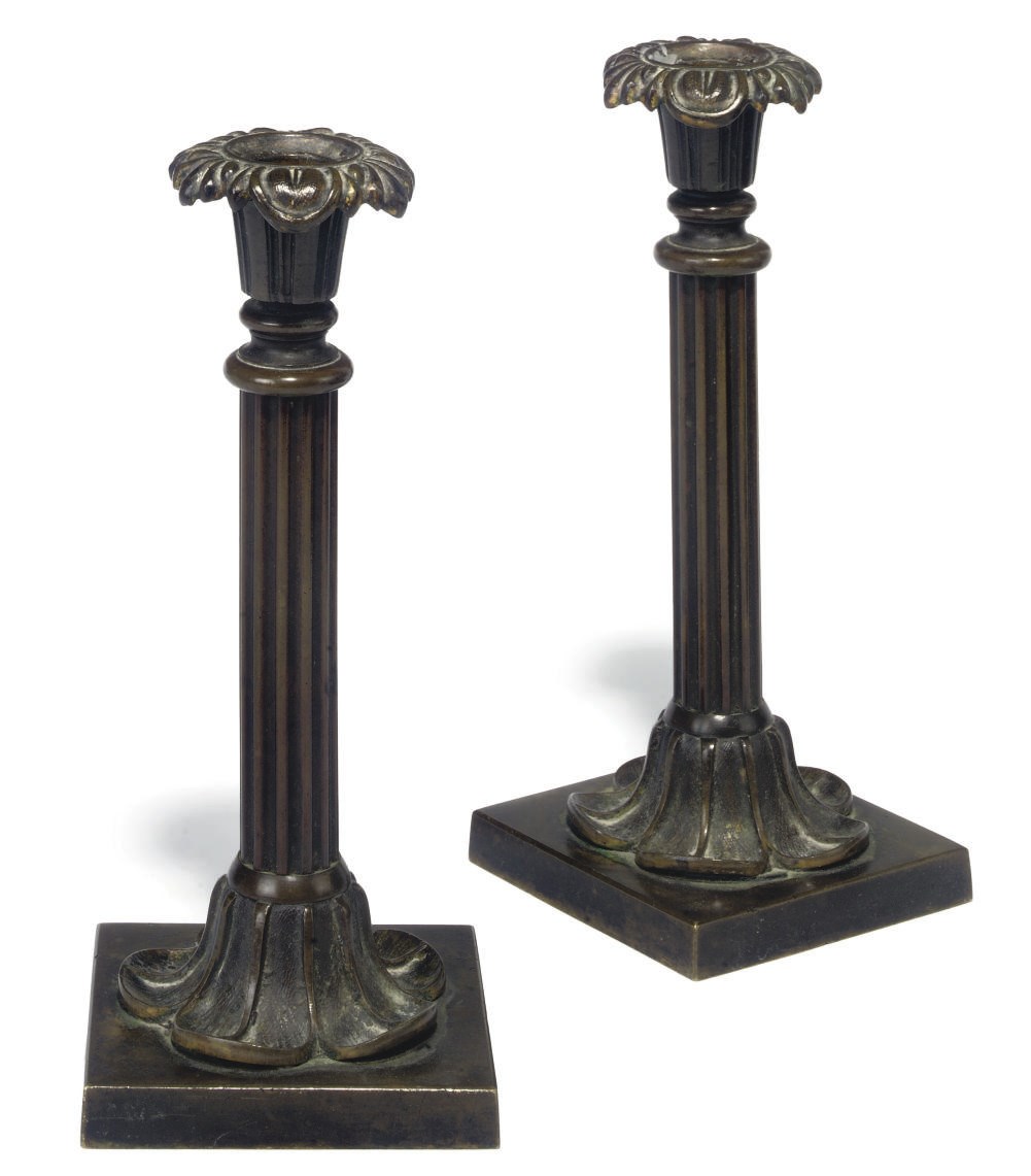 A PAIR OF REGENCY BRONZE CANDLESTICKS