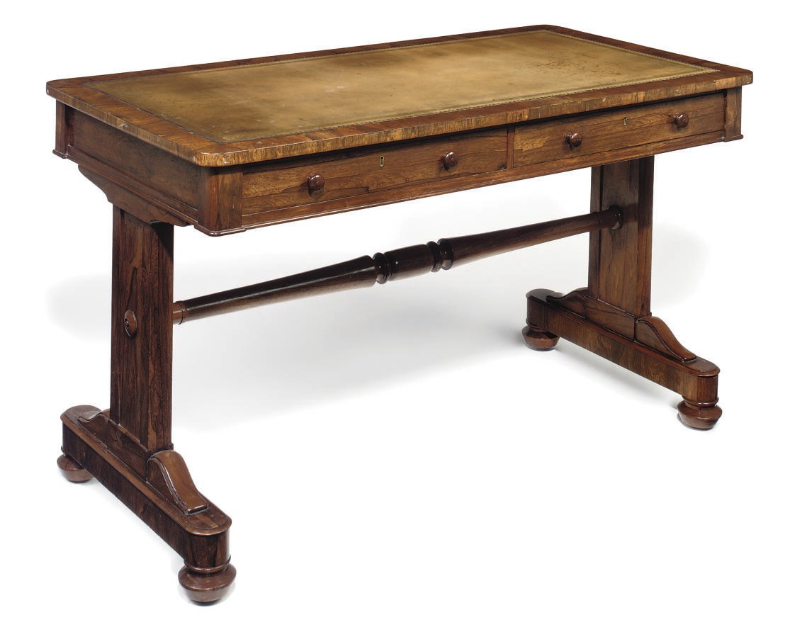 A LATE REGENCY ROSEWOOD LIBRARY TABLE