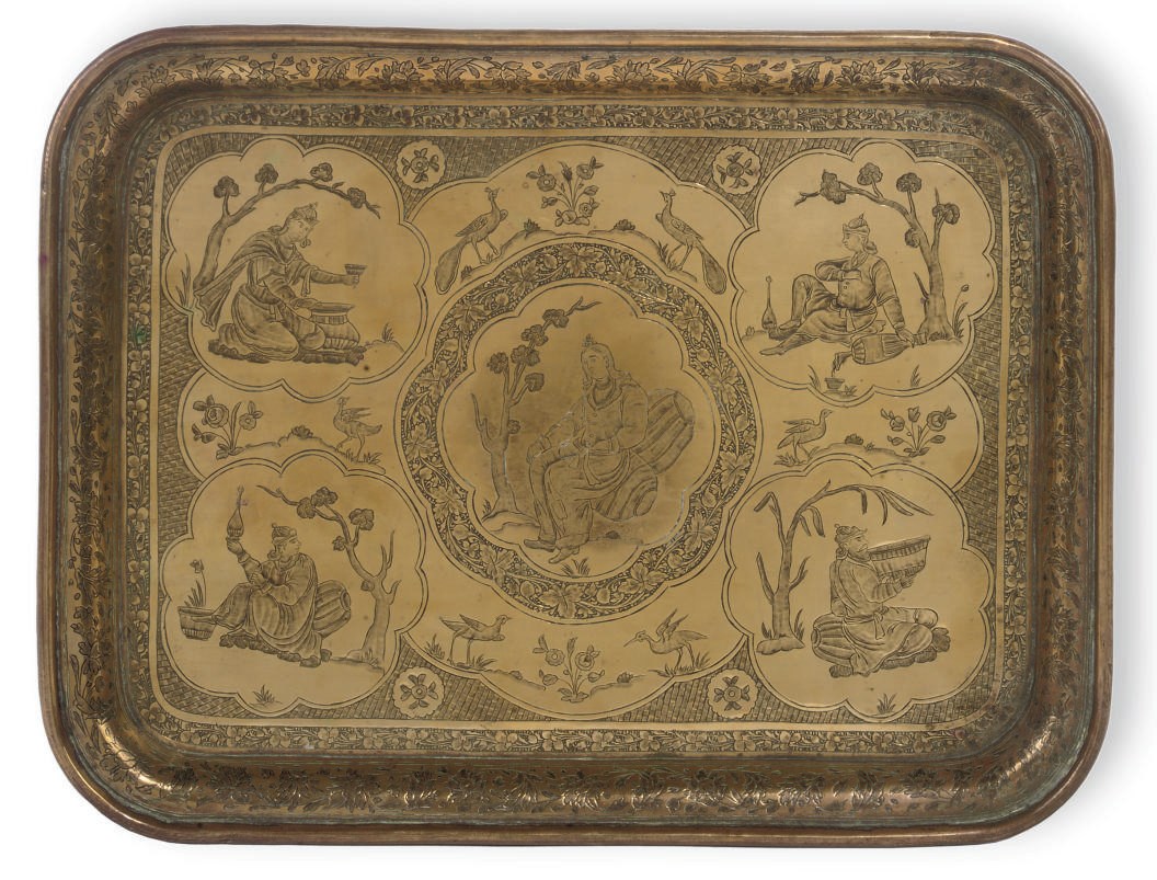 A PERSIAN ENGRAVED BRASS TRAY DEPICTING SCENES FROM THE RUBAIYAT OF OMAR KHAYYAM