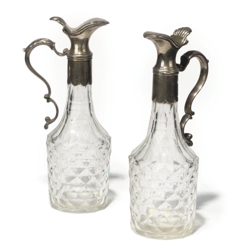A PAIR OF SILVER-PLATE-MOUNTED CUT-GLASS OIL AND VINEGAR EWERS
