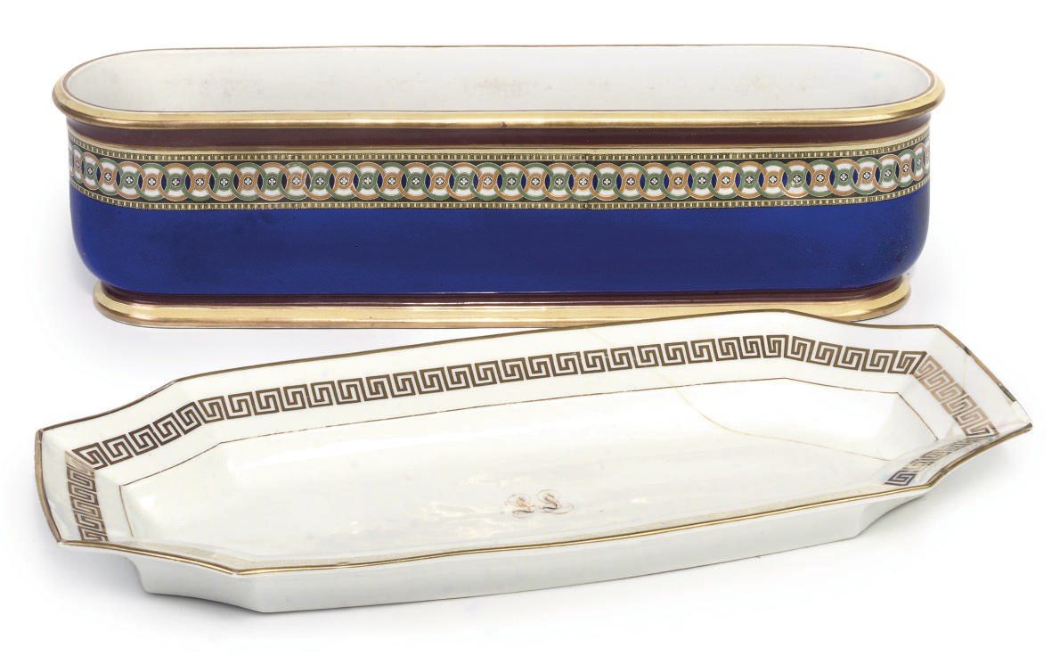 AN ENGLISH PORCELAIN JARDINIERE AND A FRENCH PORCELAIN FISH PLATTER