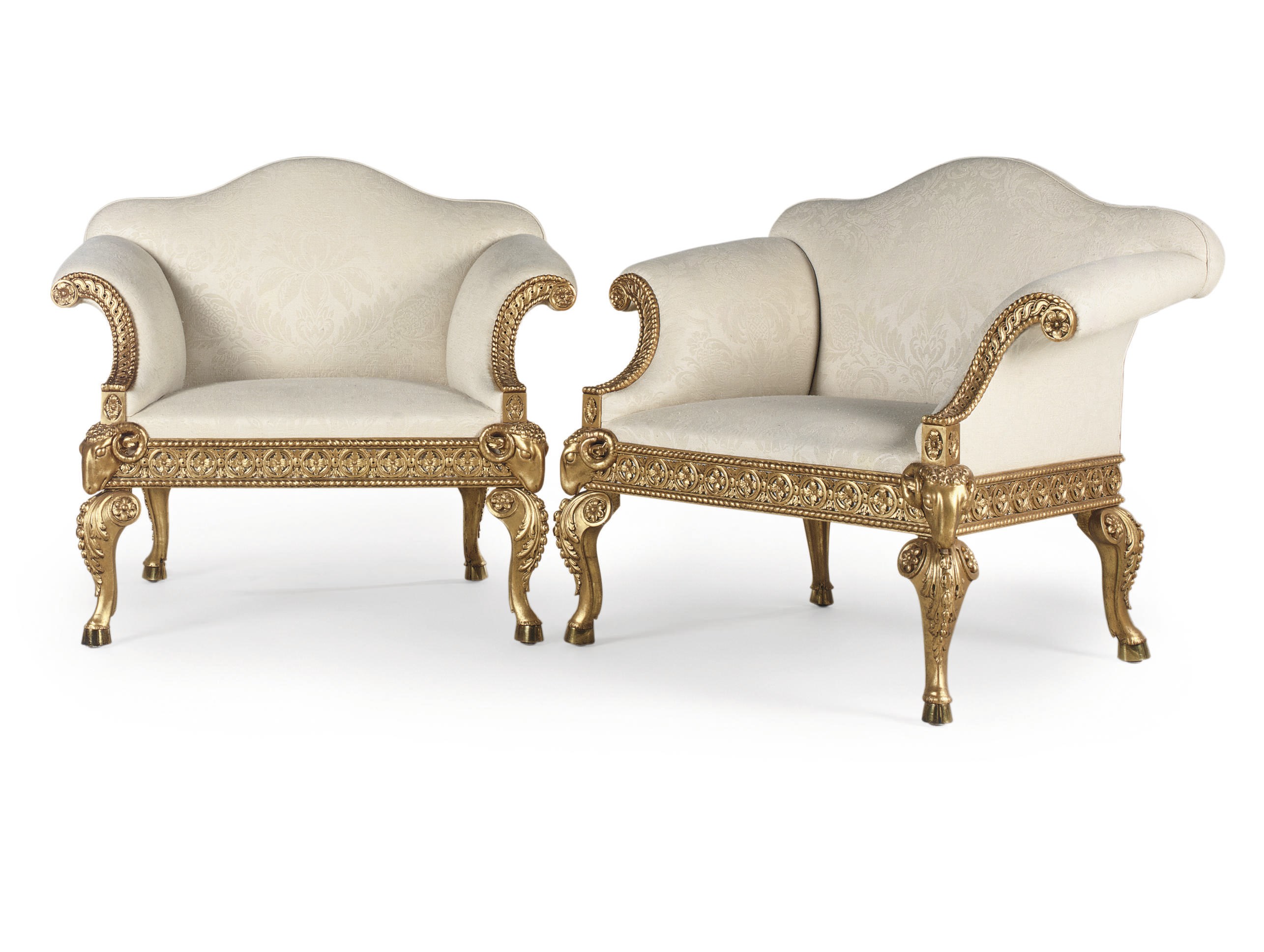 A PAIR OF GEORGE III GILTWOOD ARMCHAIRS