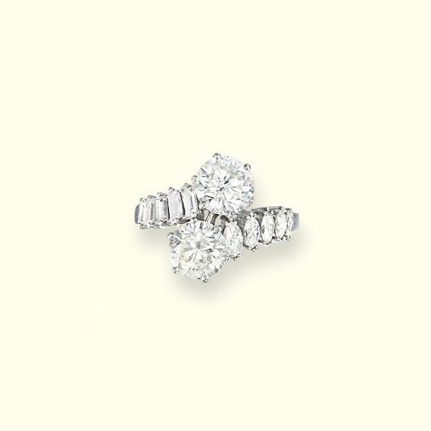 A DIAMOND TWO-STONE RING
