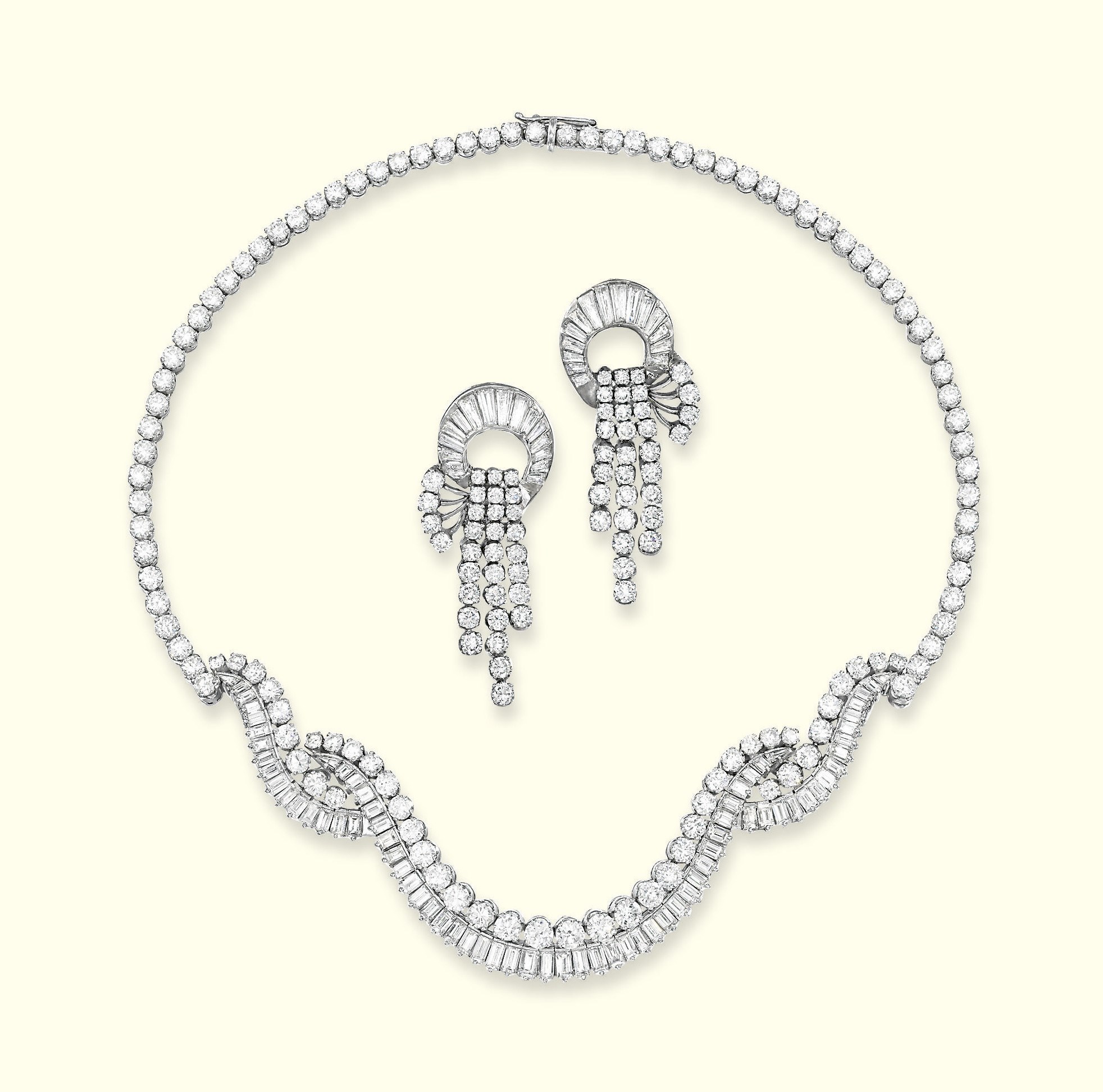 A DIAMOND NECKLACE AND A PAIR OF EAR PENDANTS