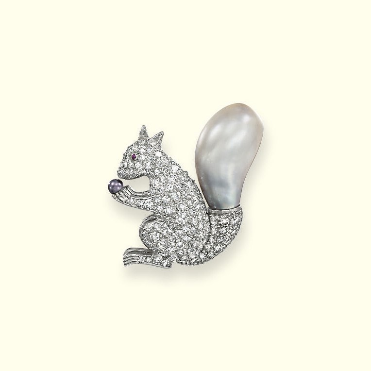 AN AMUSING NATURAL PEARL AND DIAMOND SQUIRREL BROOCH