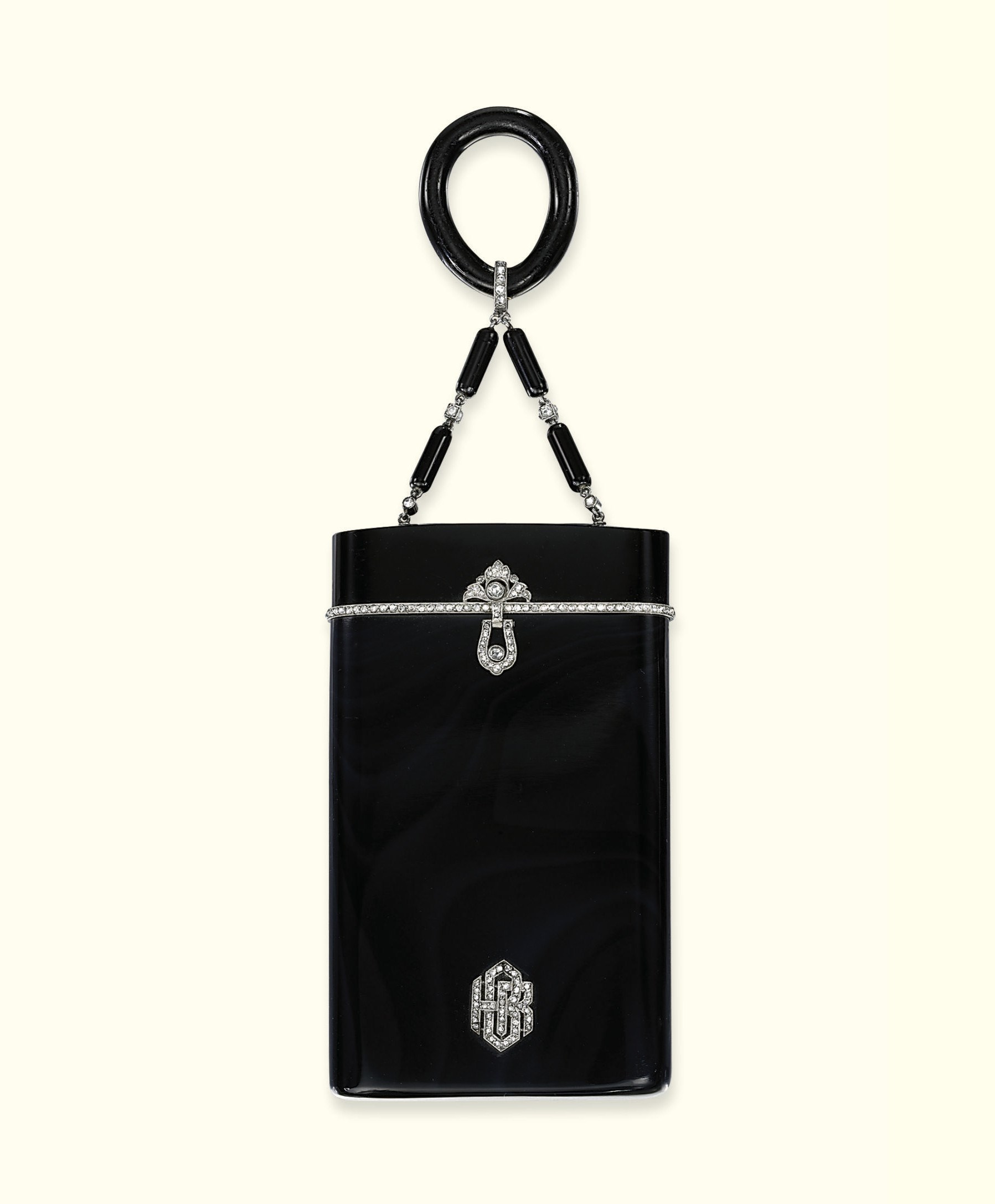 AN ART DECO AGATE AND DIAMOND CIGARETTE CASE