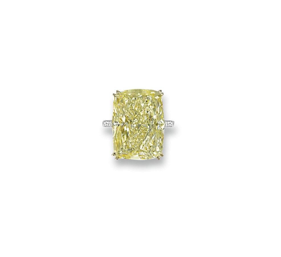 A COLOURED DIAMOND SINGLE-STONE RING