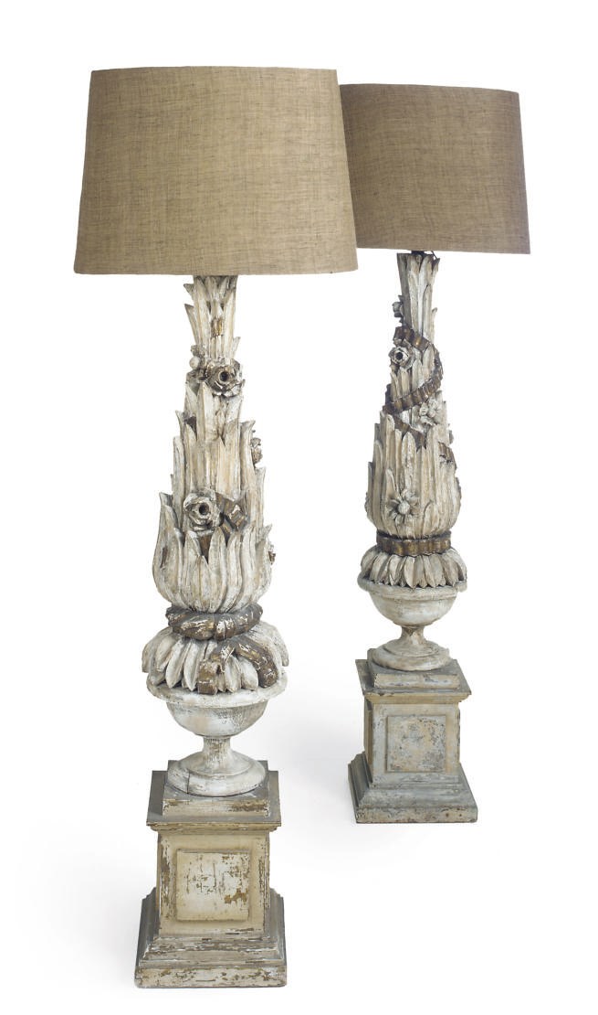A PAIR OF WHITE PAINTED CARVED PINE STANDARD LAMPS